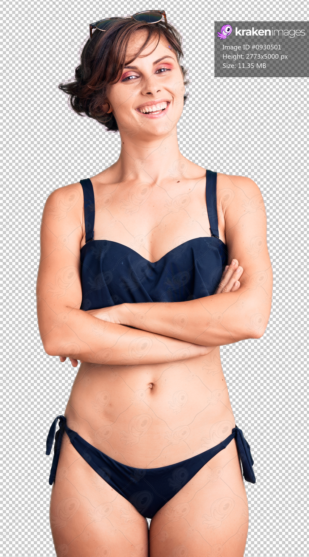 Beautiful young woman with short hair wearing bikini happy face smiling with crossed arms looking at the camera. positive person.