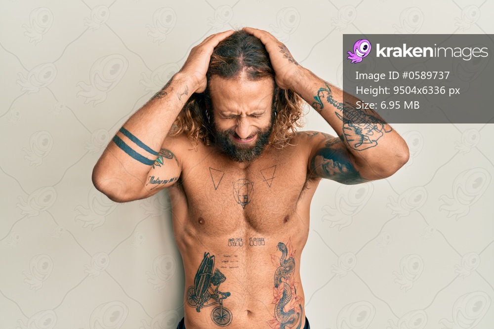 Premium Photo | Tattoo artist redhead man isolated on blue background with  headache