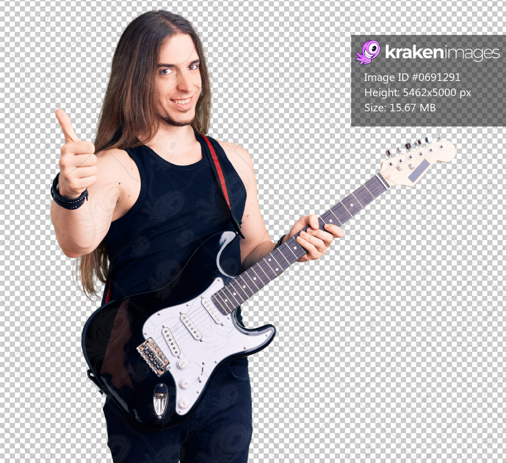 Young adult man with long hair playing electric guitar smiling happy and positive, thumb up doing excellent and approval sign